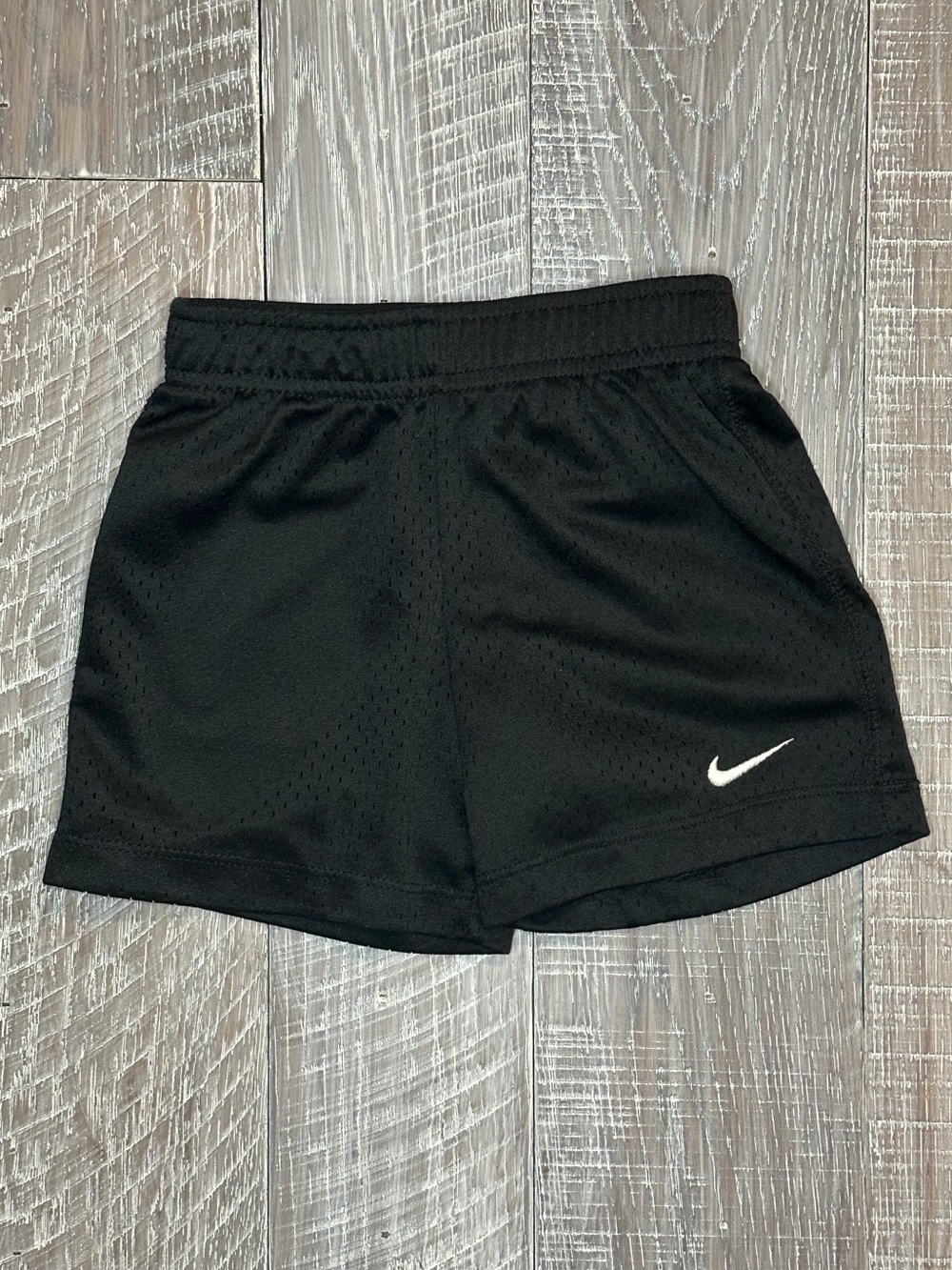 Nike 24M Black Mesh Performance Shorts with White Swoosh